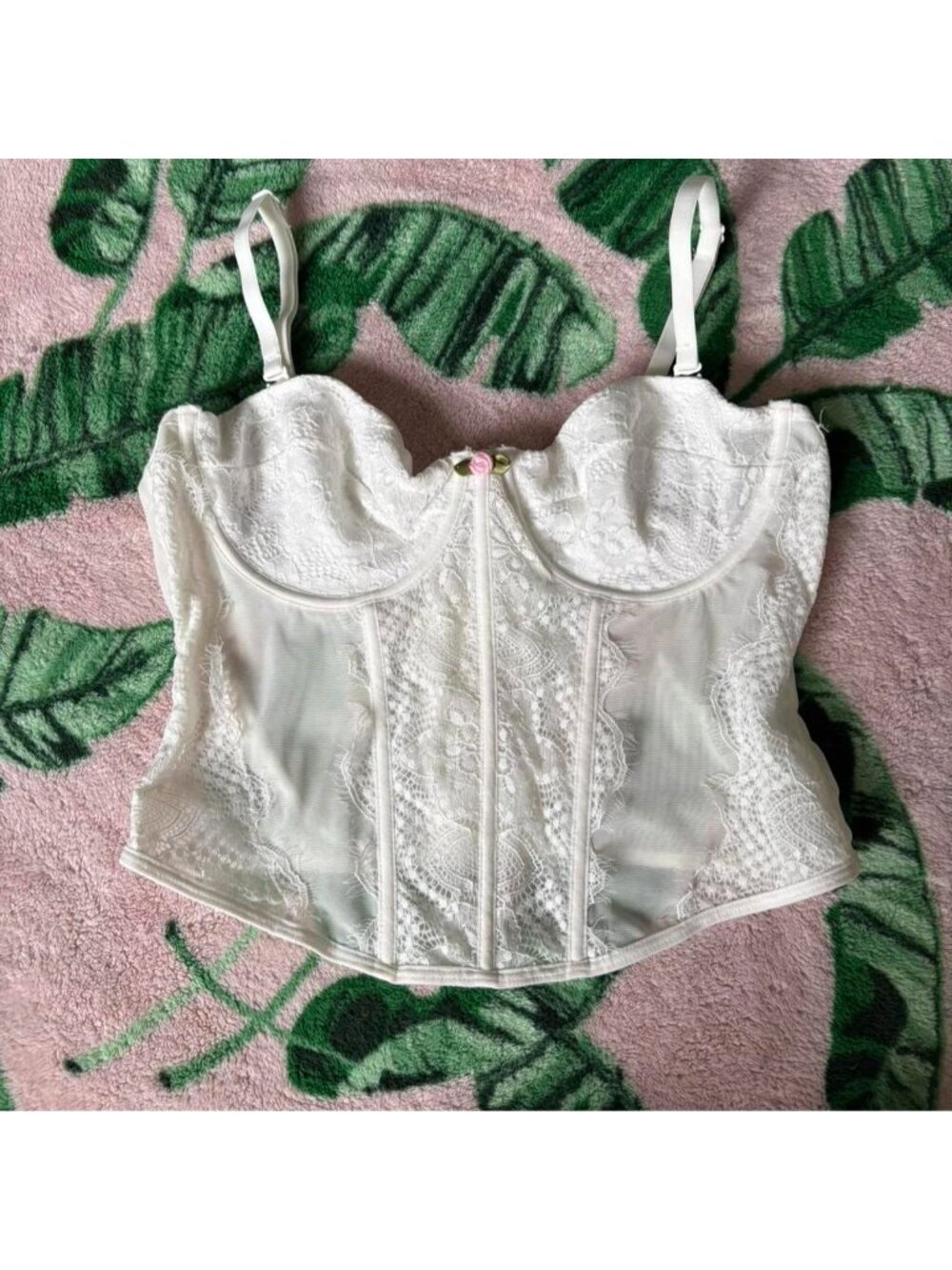 Whte lace bustier with pink rose embellishment